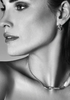 Mart Visser by ZINZI zilveren luxe oorringen 18x8mm geknoopte vorm bezet met witte zirconia's MVO19