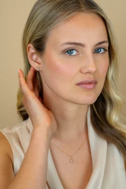 7mm ZINZI Gold 14 krt gouden fantasie oorstekers, bezet met witte zirkonia's ZGO545