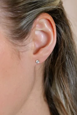 4,5mm ZINZI Gold 14 krt gouden oorknoppen bezet met een witte zirkonia in zespootszetting ZGO544