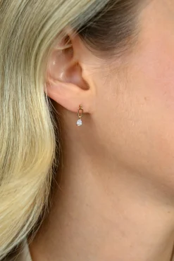 12mm ZINZI Gold 14 krt gouden oorstekers, open ovaal met peervormige witte zirkonia ZGO548