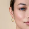 21mm ZINZI gold plated zilveren halve oorringen 4mm buisdikte, bezet met 12 witte zirconia's en met vlindersluiting ZIO2573Y