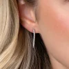 23mm ZINZI zilveren tennis oorstekers met rijzetting witte zirconia's ZIO2794