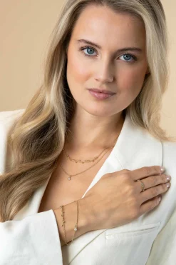 ZINZI gold plated zilveren aanschuifring met bolletjes scheen en drie ronde zettingen bezet met witte zirconia ZIR2569