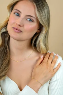 ZINZI gold plated zilveren fantasie ketting met 13 geelgroene donuts en glanzende bolletjes 42-45cm ZIC2508