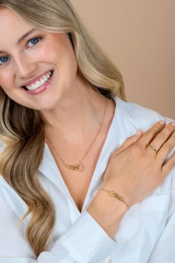 ZINZI goldplated zilveren schakelarmband met twee verbonden schakels, bezet met witte zirkonia's ZIA2809