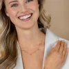 ZINZI gold plated zilveren schakelketting met vier witte zirkonia's en 3 ronde bolletjes, gelijkmatig verdeeld over de ketting 42-45cm ZIC2658