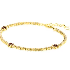 ZINZI gold plated zilveren tennisarmband 2,1mm breed bezet met champagnekleurige zirkonia’s in verfijnde rijzetting, afgewisseld met drie grotere donkerbruine kleurstenen (4,3mm) in chatonzetting ZIA2894C