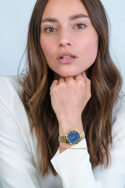 ZINZI horloge JULIA 34mm donkerblauwe parelmoer wijzerplaat romeinse cijfers goudkleurige stalen kast en band ziw1147