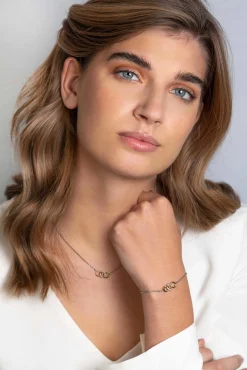 ZINZI zilveren armband geel verguld 3 open rondjes verbonden wit ZIA2045Y