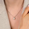ZINZI zilveren ketting met een witte parelhanger (12mm) en een strikvormige zetting bezet met witte zirkonia’s 42-45cm ZIC2863