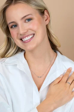 ZINZI zilveren ring met trendy cilindervorm, bezet met diverse witte zirkonia’s ZIR2812