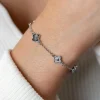 ZINZI zilveren schakel armband met twee zilveren en drie blauwe klavers 16-19cm ZIA2582