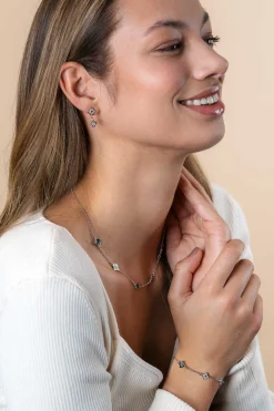 ZINZI zilveren schakel armband met twee zilveren en drie blauwe klavers 16-19cm ZIA2582