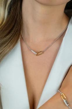 ZINZI zilveren schakelketting met twee verbonden ovale schakels: één gold plated, de ander bezet met witte zirkonia's 42-45cm ZIC2758